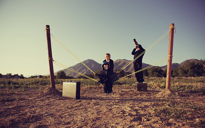 Business Children with Human Slingshot